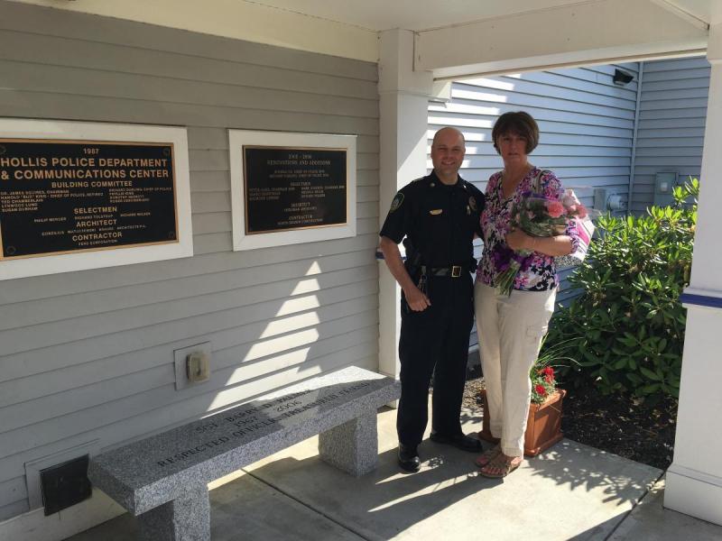 Chief Sartell and Nancy Palmer dedicate the memorial bench on June 20, 2016.