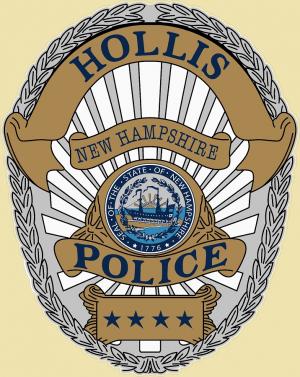 Hollis police badge tan background